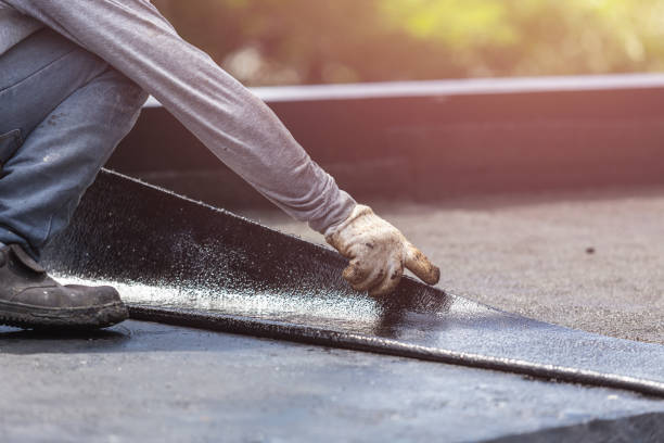 Professional Basement Waterproofing technician working in Helenville, WI